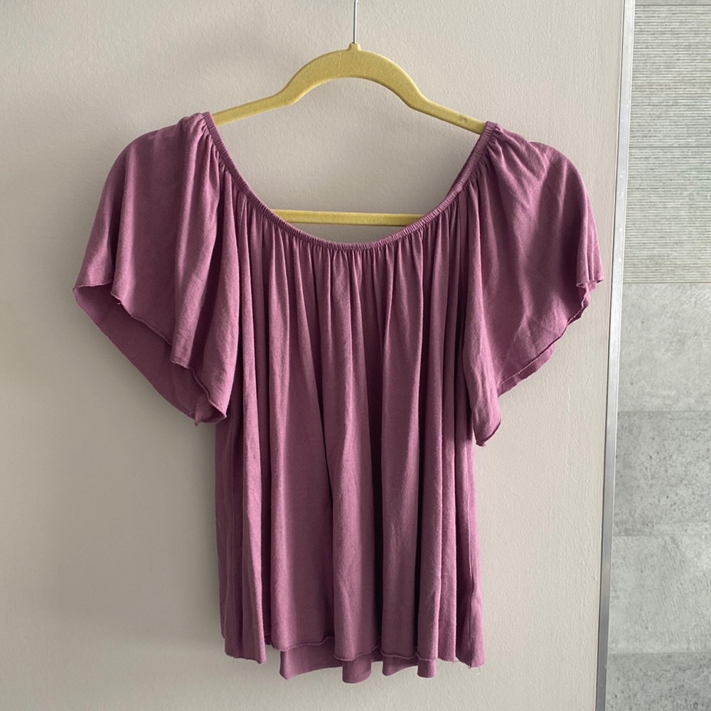 Functional light purple blouse that can be worn over or on the shoulders!